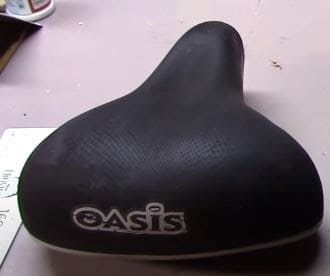 Wide bike saddle