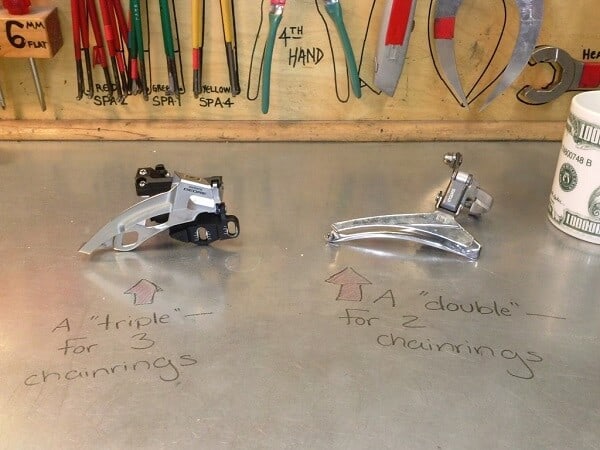 Double and triple cage derailleurs